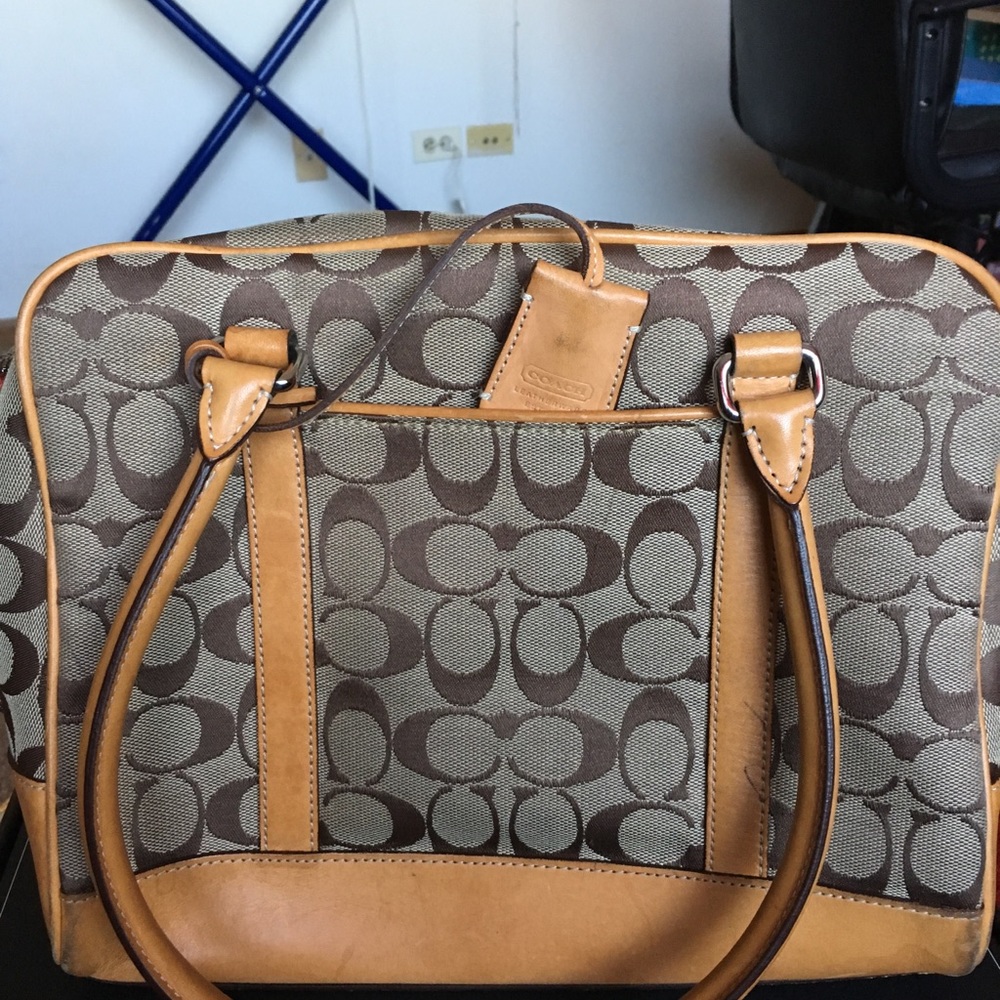Coach purse 👜 pop of orange interior! Well loved!